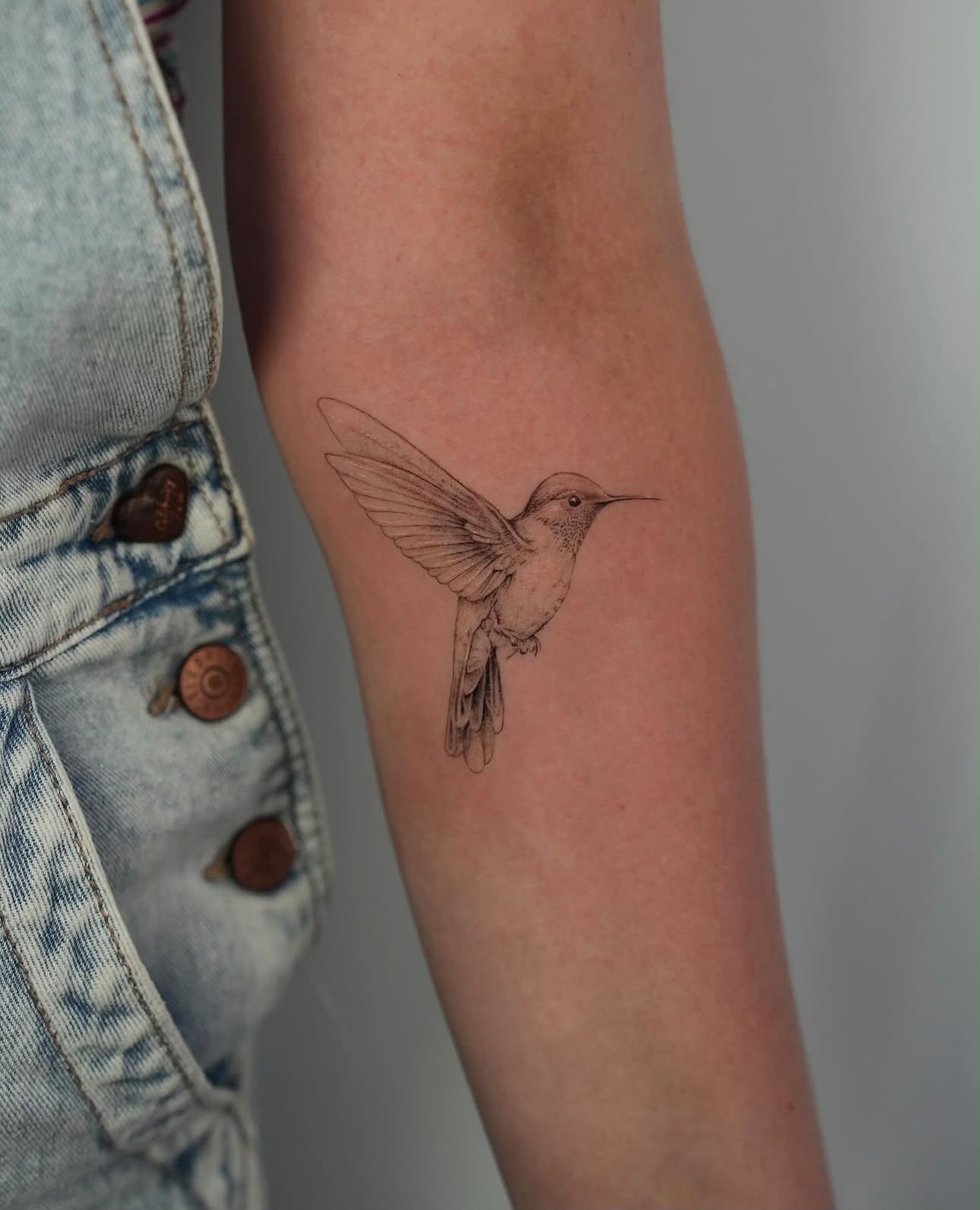 Fine line hummingbird tattoo