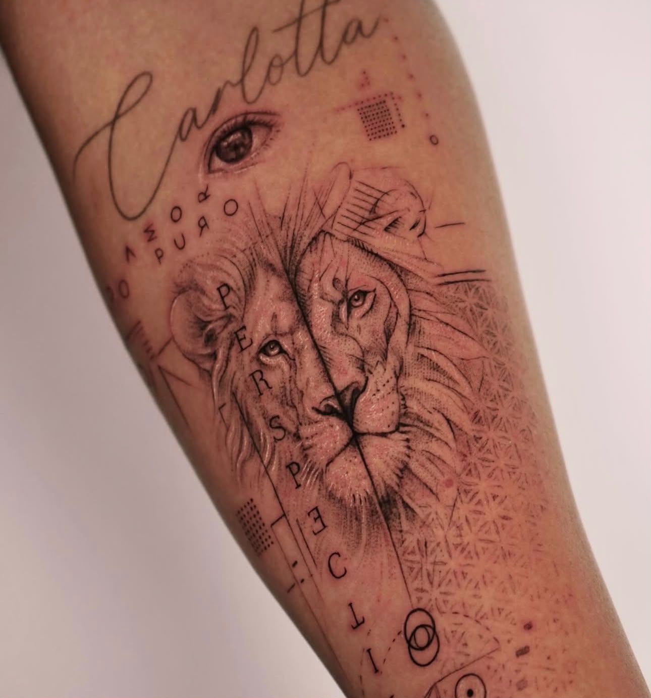 Detailed tattoo of two lions