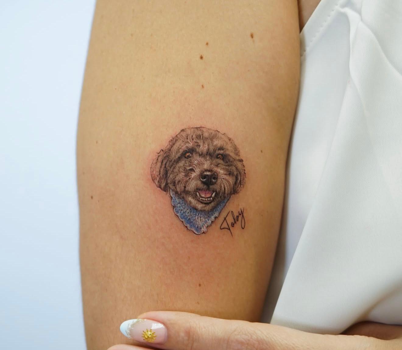 Small realistic tattoo of a beloved dog