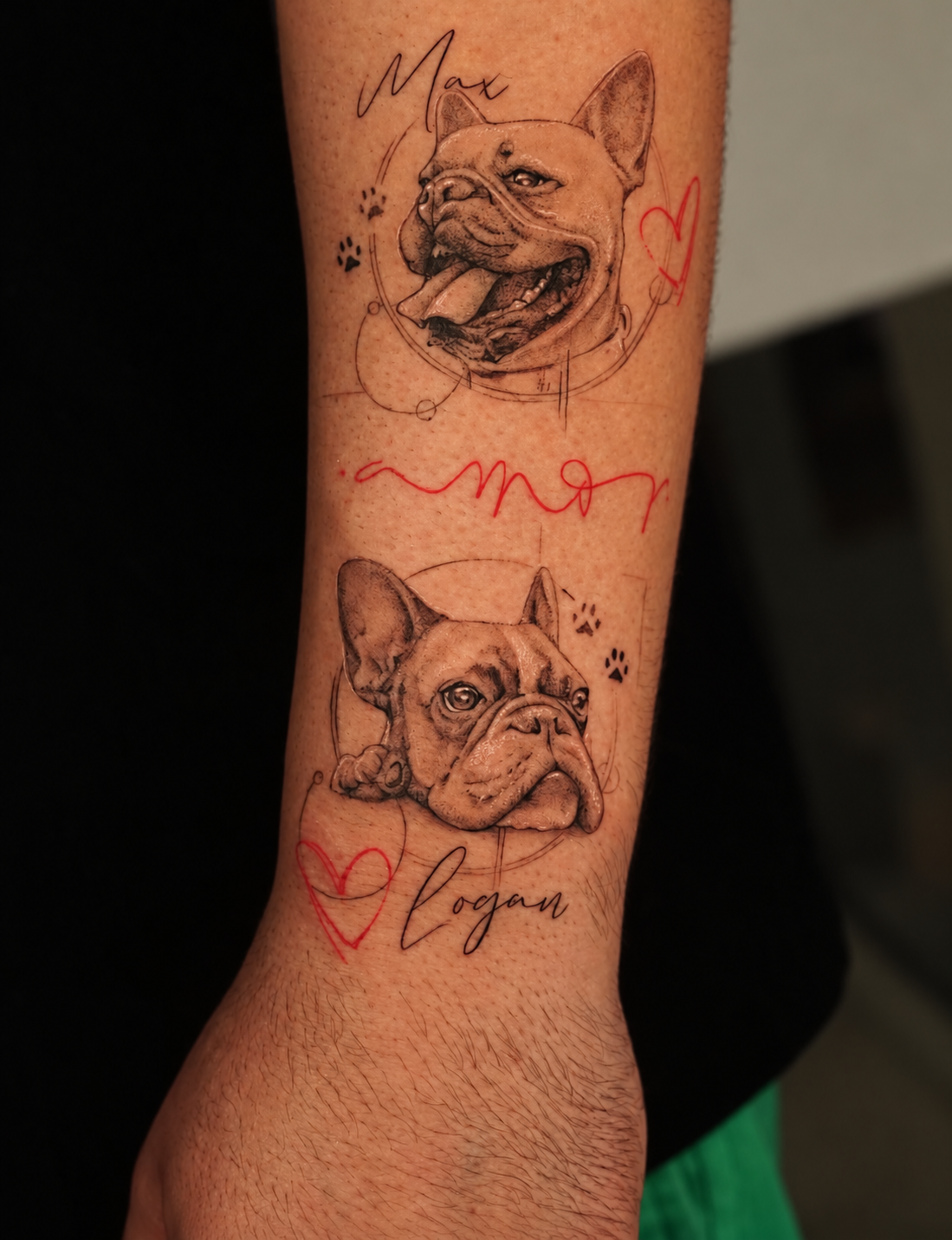 Portrait tattoos of two dogs with handwritten names